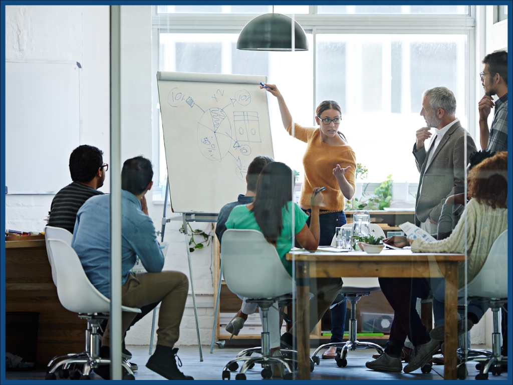 Team meeting discussing business strategy